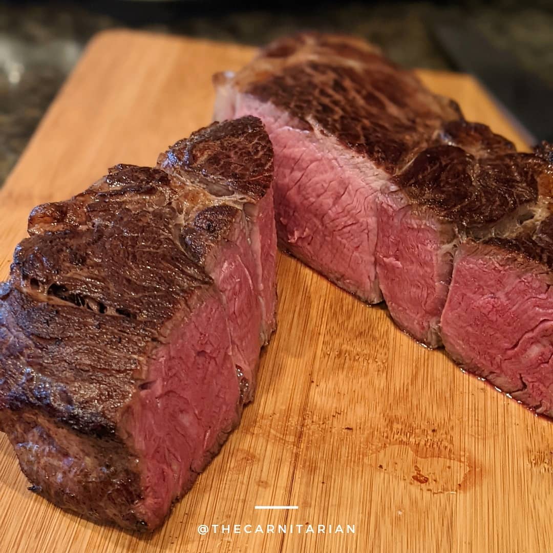 perfectly cooked steaks on cinder grill