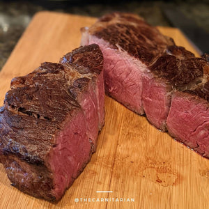 perfectly cooked steaks on cinder grill