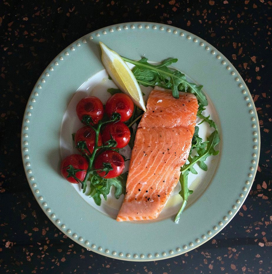 Salmon Fillet with cherry tomatoes precise cooking on indoor grill 