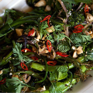 Grilled Broccolini with onions and herbs from the Cinder Grill