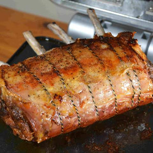 a mouthwatering Pork Loin Roast on the Cinder Grill